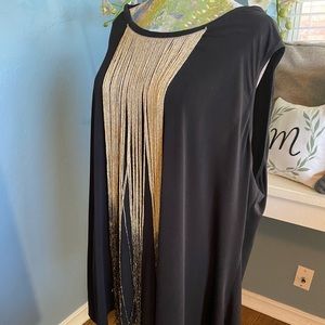 Sleeveless blouse with gold fringe detail